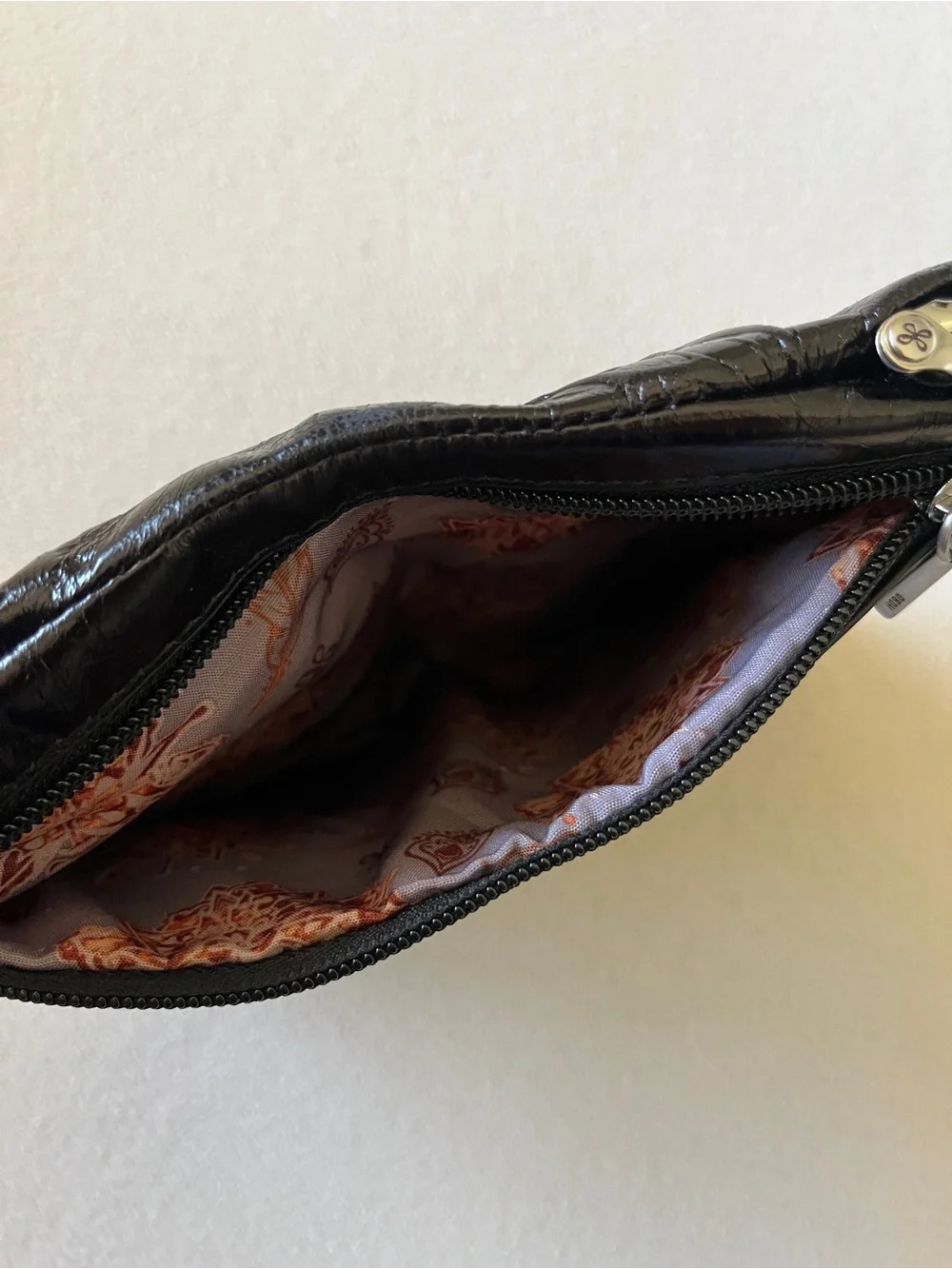 HOBO Black Floral Flower Embossed Leather Wallet Clutch Paisley Lining Silver
